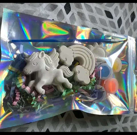 Unicorn and rainbow art kit packed with paint and a brush