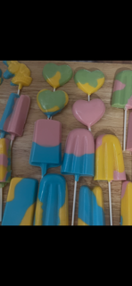 Pastel chocolate treats in party shapes
