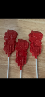 Red character-shaped chocolate suckers